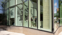 View looking in to Columbia Nursing building through glass windows.